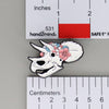 NerdyKeppie Proud to the Bone Triceratops Skull Pride Enamel Pins. A Triceratops skull pride enamel pin for our Proud to the Bone project. This prehistoric pin is wearing an adorable crown of flowers!