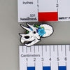 NerdyKeppie Proud to the Bone Triceratops Skull Pride Enamel Pins. A Triceratops skull pride enamel pin for our Proud to the Bone project. This prehistoric pin is wearing an adorable crown of flowers!