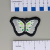 NerdyKeppie's Psychedelic Butterfly Embroidered Pride Patch are shaped like their namesake and stitched on black duck cloth!
