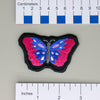 NerdyKeppie's Psychedelic Butterfly Embroidered Pride Patch are shaped like their namesake and stitched on black duck cloth!