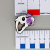 NerdyKeppie Proud to the Bone Sabertooth Tiger Skull Pride Enamel Pins. A Sabertooth Tiger skull pride enamel pin for our Proud to the Bone project, a perfect prehistoric gift for your favorite nerd. This prehistoric pin wears an adorable flower crown!