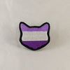 NerdyKeppie's Queer (Purple) Cat Embroidered Pride Patch are shaped like their namesake and stitched on black duck cloth!