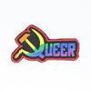 NerdyKeppie's Rainbow BONEYARD "Queer" Hammer & Sickle Embroidered Pride Patch are stitched on black duck cloth and backed by sturdy vinyl fuse.