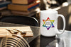 NerdyKeppie "B'tzelem Elohim" Star Of David Pride Coffee Mug. Our "B'tzelem Elohim" Star Of David Pride Coffee Mug is 15 ounces deep and ships directly from Portland, Oregon USA.