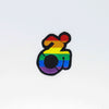 NerdyKeppie's Rainbow Disability Symbol Embroidered Pride Patch are shaped like their namesake and stitched on black duck cloth!