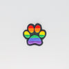 NerdyKeppie's Rainbow Dog Paw Embroidered Pride Patch are shaped like their namesake and stitched on black duck cloth!
