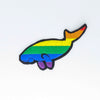 NerdyKeppie's Rainbow Dugong Embroidered Pride Patch are shaped like their namesake and stitched on black duck cloth!