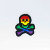 NerdyKeppie's Rainbow Skull And Crossbones Embroidered Pride Patch are stitched on black duck cloth and backed by sturdy vinyl fuse.