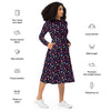 A person wearing a NerdyKeppie Raveyard Ghosts Genderfluid Pride Long Sleeve Midi Dress With Pockets. 