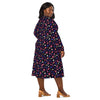 A person wearing a NerdyKeppie Raveyard Ghosts Genderfluid Pride Long Sleeve Midi Dress With Pockets. 