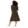 A person wearing a NerdyKeppie Raveyard Ghosts Lesbian Pride Long Sleeve Midi Dress With Pockets. 