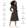 A person wearing a NerdyKeppie Raveyard Ghosts Non-Binary Pride Long Sleeve Midi Dress With Pockets. 