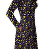 A person wearing a NerdyKeppie Raveyard Ghosts Non-Binary Pride Long Sleeve Midi Dress With Pockets. 