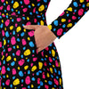 A person wearing a NerdyKeppie Raveyard Ghosts Pan Pride Long Sleeve Midi Dress With Pockets. 