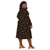 A person wearing a NerdyKeppie Raveyard Ghosts Rainbow Gay Pride Long Sleeve Midi Dress With Pockets. 