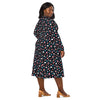 A person wearing a NerdyKeppie Raveyard Ghosts Trans Pride Long Sleeve Midi Dress With Pockets. 