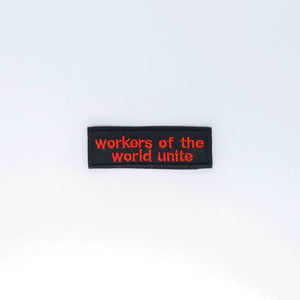 NerdyKeppie's Red "Workers of the World Unite" Embroidered Patch are stitched on sturdy rectangular duck cloth and backed with vinyl fuse.