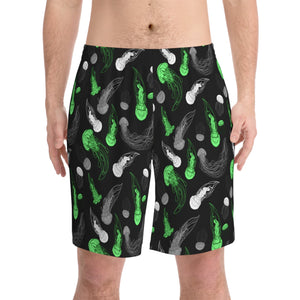 NerdyKeppie Jellyfish Aro Pride Swim Trunks With Pockets. A pair of swim trunks featuring a Jellyfish design in aromantic pride colors. These aro pride swim trunks are machine washable.