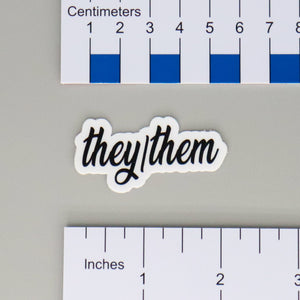 NerdyKeppie Script Pronoun Stickers. Our script pronoun stickers feature black text on a matte white vinyl background. Each script pronoun sticker ships from Portland, Oregon.