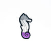NerdyKeppie's Seahorse Embroidered Pride Patch are shaped like their namesake and stitched on black duck cloth!