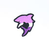 NerdyKeppie's Shark Embroidered Pride Patch are shaped like their namesake and stitched on black duck cloth!