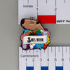 NerdyKeppie Capybara Enamel Progress Pride Pronoun Pins. Our enamel pin features an adorable capybara, a paper scroll with six different pronoun choices, and flowers in Progress pride colors. This pride pin ships from Portland, Oregon.
