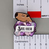 NerdyKeppie Capybara Enamel Queer Pride Pronoun Pins. Our enamel pin features an adorable capybara, a paper scroll with seven different pronoun choices, and flowers in queer pride colors. This pride pin ships from Portland, Oregon.