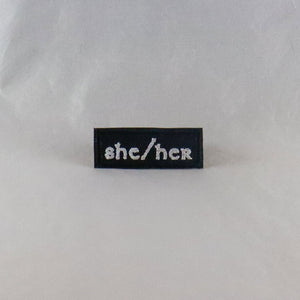 NerdyKeppie's She/Her Celtic Font Embroidered Pronoun Patch are stitched on sturdy rectangular duck cloth and backed with vinyl fuse.