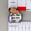 NerdyKeppie Capybara Enamel Genderqueer Pride Pronoun Pins. Our enamel pin features an adorable capybara, a paper scroll with three different pronoun choices, and flowers in genderqueer pride colors. This pride pin ships from Portland, Oregon.