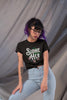NerdyKeppie "Sidhe/Her" Floral Unisex Cotton Trans Pride Tee Shirt. 