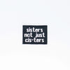 NerdyKeppie's "Sisters Not Just Cis-Ters" Embroidered Trans Pride Patch are stitched on black duck cloth and backed by sturdy vinyl fuse.