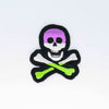 NerdyKeppie's Skull And Crossbones Embroidered Pride Patch are stitched on black duck cloth and backed by sturdy vinyl fuse.