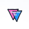 NerdyKeppie's Small (4" x 4.5") White Letters "Disaster Bi" Embroidered Bisexual Pride Patch are stitched on black duck cloth and backed by sturdy vinyl fuse.