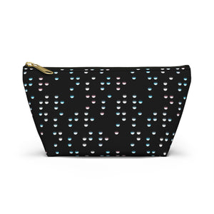 NerdyKeppie Braille Trans Pride Zipper Pouch with T-Bottom. A zippered accessory/makeup bag featuring a t-bottom and a Braille pattern in trans pride colors. This pride zipper pouch is fully lined and comes in two sizes.