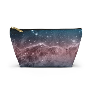 NerdyKeppie Carina Nebula Trans Pride Zipper Pouch with T-Bottom. A zippered accessory/makeup bag featuring a t-bottom and a [PATTERN] pattern in transgender pride colors. This trans pride zipper pouch is fully lined and comes in two sizes.