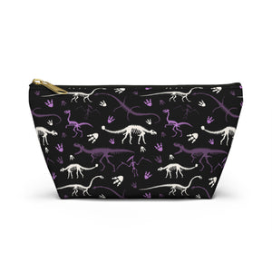NerdyKeppie Dino Bones Queer Pride Zipper Pouch with T-Bottom. A zippered accessory/makeup bag featuring a t-bottom and a Dino Bones pattern in queer pride colors. This pride zipper pouch is fully lined and comes in two sizes.