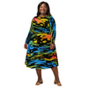 A person wearing a NerdyKeppie Splatter Wave Pan Pride Long Sleeve Midi Dress With Pockets. 