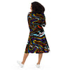 A person wearing a NerdyKeppie Splatter Wave Progress Pride Long Sleeve Midi Dress With Pockets. 