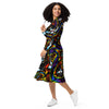 A person wearing a NerdyKeppie Splatter Wave Progress Pride Long Sleeve Midi Dress With Pockets. 