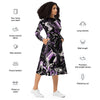 A person wearing a NerdyKeppie Splatter Wave Queer Pride Long Sleeve Midi Dress With Pockets. 