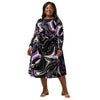 A person wearing a NerdyKeppie Splatter Wave Queer Pride Long Sleeve Midi Dress With Pockets. 