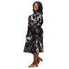 A person wearing a NerdyKeppie Splatter Wave Queer Pride Long Sleeve Midi Dress With Pockets. 