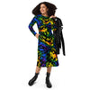 A person wearing a NerdyKeppie Splatter Wave Rainbow Gay Pride Long Sleeve Midi Dress With Pockets. 