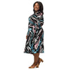 A person wearing a NerdyKeppie Splatter Wave Trans Pride Long Sleeve Midi Dress With Pockets. 