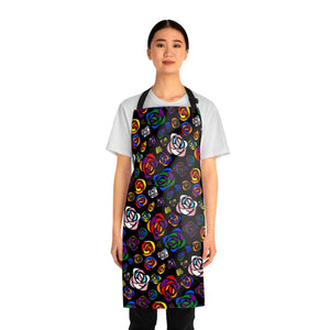 A person wearing a NerdyKeppie Stencil Roses Progress Pride Apron With Pocket. A black apron with a stencil roses design on it in progress pride colors. This gay pride pocket apron is made of durable 100% polyester.