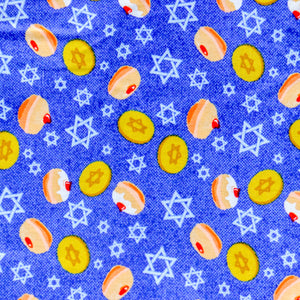A NerdyKeppie Sufganiyot & Gelt Heat & Cold Pack. A microwaveable heat and cold pack featuring a Hanukkah-themed design, great gift for Jewish friends with, you know, achy joints and stuff.