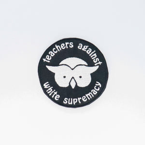 NerdyKeppie's Teachers "Educators Against White Supremacy" Embroidered Patch are stitched on black duck cloth and backed by sturdy vinyl fuse.