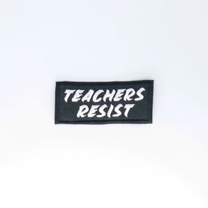 NerdyKeppie's "Teachers Resist" Embroidered Patch are stitched on sturdy rectangular duck cloth and backed with vinyl fuse.