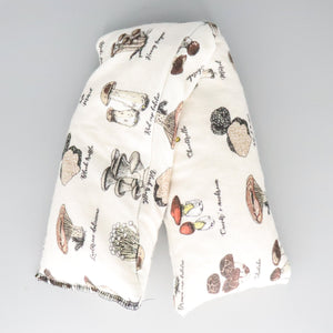 A NerdyKeppie The Fun Guy Fungi Flannel Heat & Cold Packs. A microwaveable heat and cold pack featuring a mushroom-themed design, great gift for anyone with, you know, achy joints and stuff.