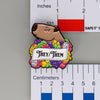 NerdyKeppie Capybara Enamel Lesbian Pride Pronoun Pins. Our enamel pin features an adorable capybara, a paper scroll with four different pronoun choices, and flowers in lesbian pride colors. This pride pin ships from Portland, Oregon.